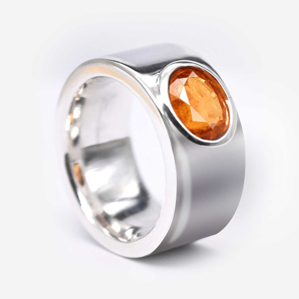 Hessonite Garnet (Gomed / ගෝමේද) oval gemstone set in a pure silver astrology ring – ජ්‍යොතිෂ මුදුව, custom made in Colombo, Sri Lanka