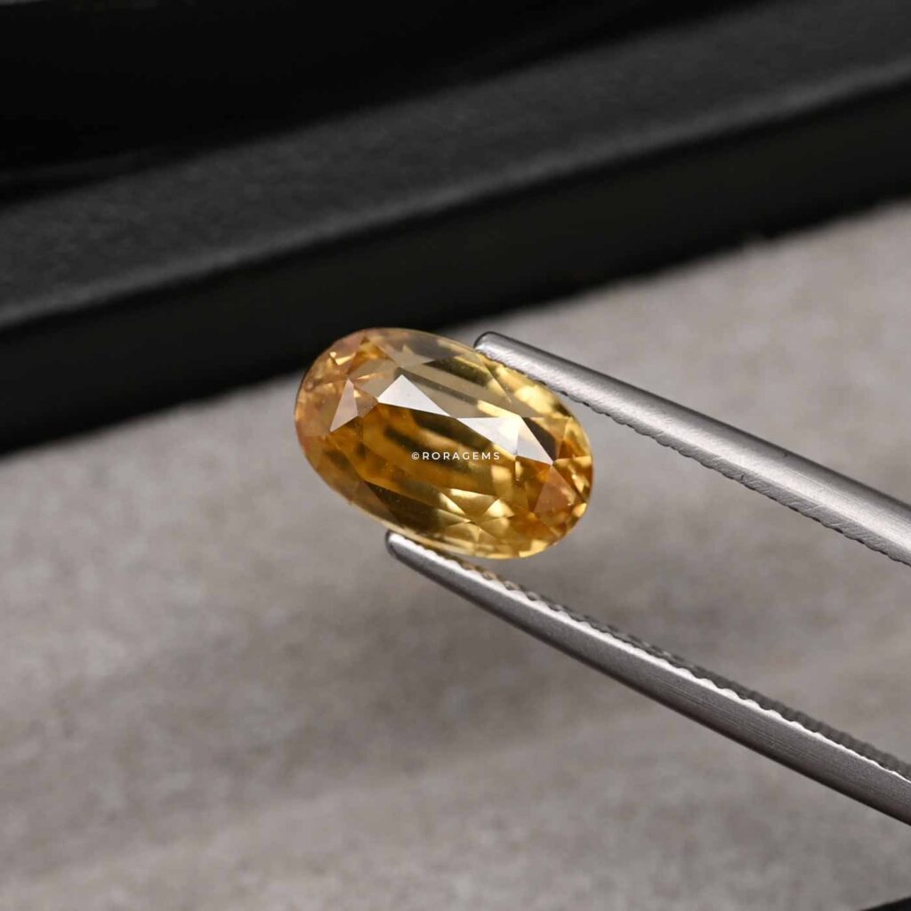 Semi-precious yellow orange gemstone available in colombo sri lanka zircon gem with bright luster and natural beauty