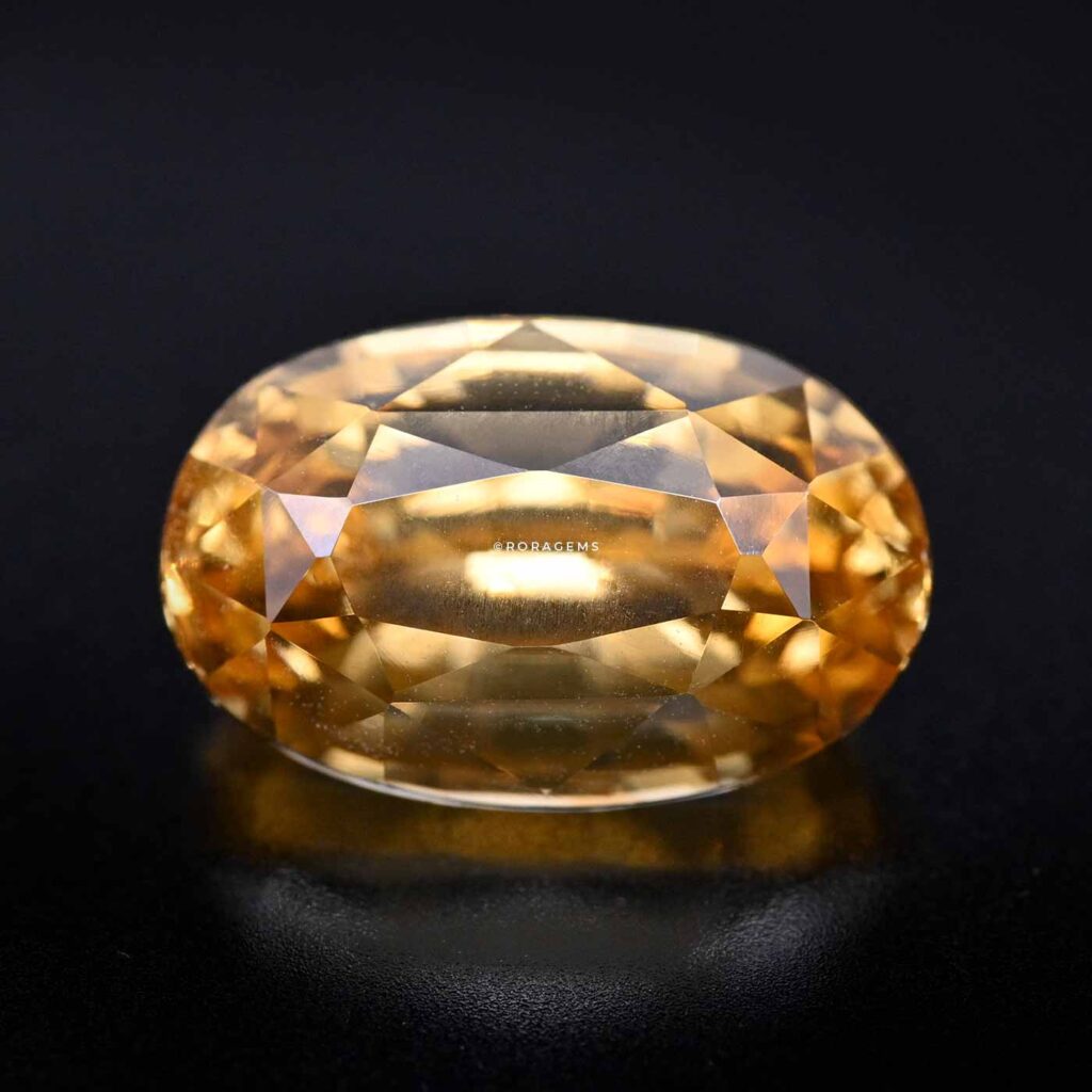 Oval-cut yellow orange gemstone zircon suitable for rings, pendants, custom jewelry designs gifting pujas poojas items