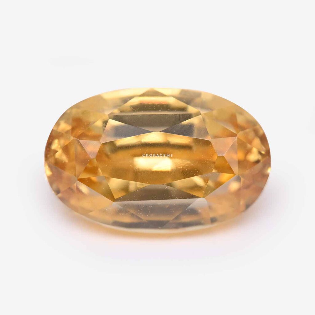 yellowish-orange zircon jemstone gem yelow yelo color 4.80 carats oval shape excellent brilliance in borella colombo sri lanka