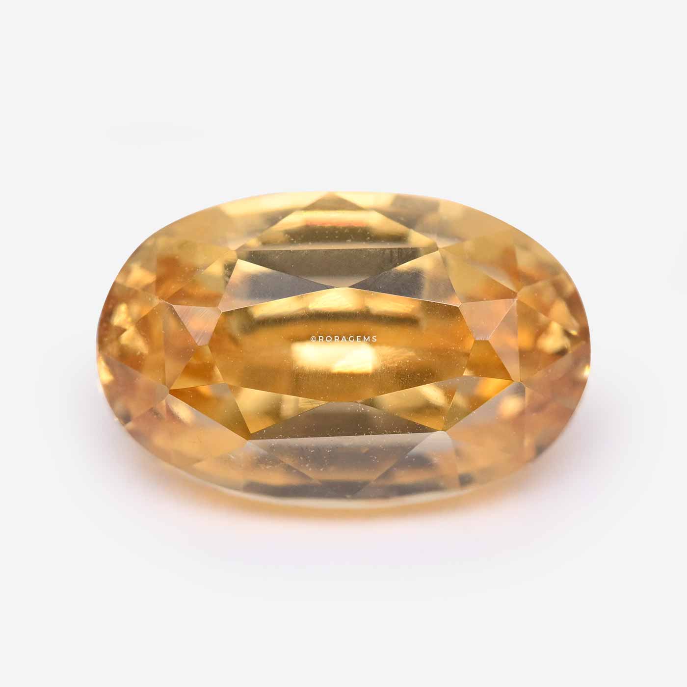 yellowish-orange zircon jemstone gem yelow yelo color 4.80 carats oval shape excellent brilliance in borella colombo sri lanka