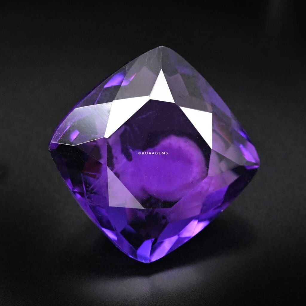 Fine ametist and amethist purple quartz gemstone with cushion cut and collector grade appearance