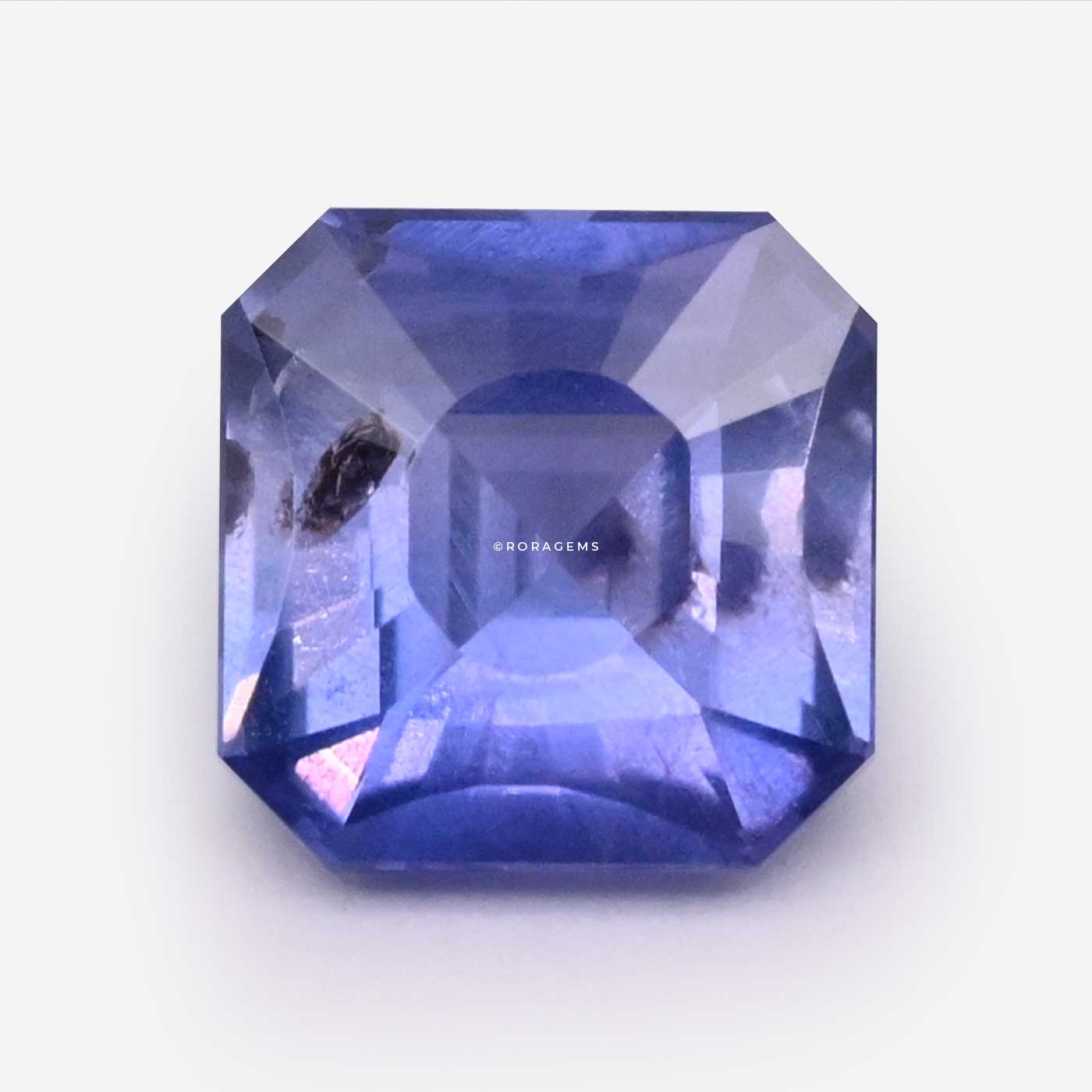 Unheated square cut blue sapphire pastel blue and violet universal tones gemstone for art and craft gifts.