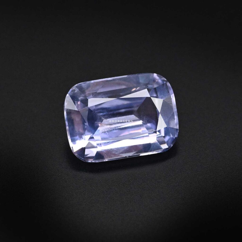 Violat saphire natural corundum specimen from Sri Lanka with rectangular cushion shape for jewelry design and study purposes.