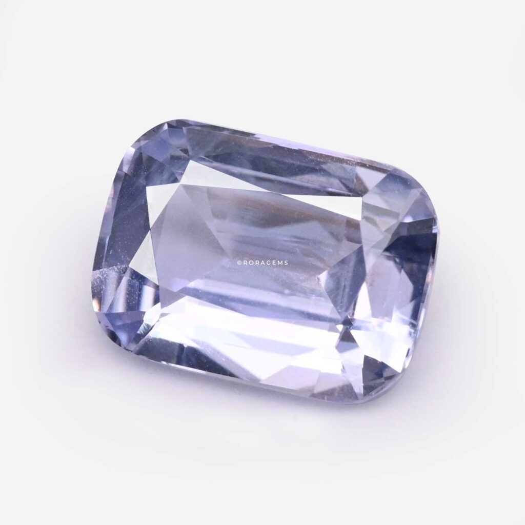 Natural Ceylon violet sapphire from Sri Lanka featuring a rectangular cushion cut and light violet color ideal for custom jewelry.