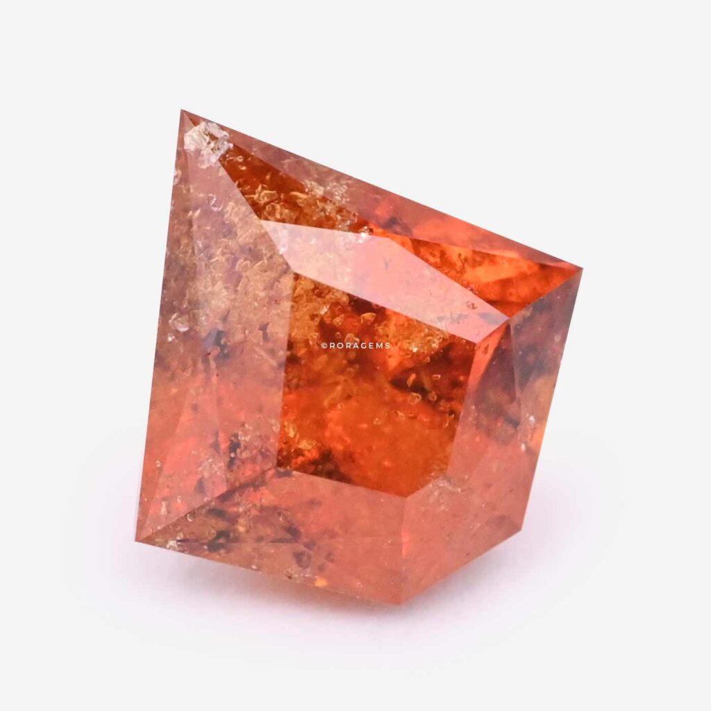 Ceylon hessonite garnet kite-cut gemstone with warm orange cinnamon tones suitable for astrology and fine jewelry in borella colombo sri lanka